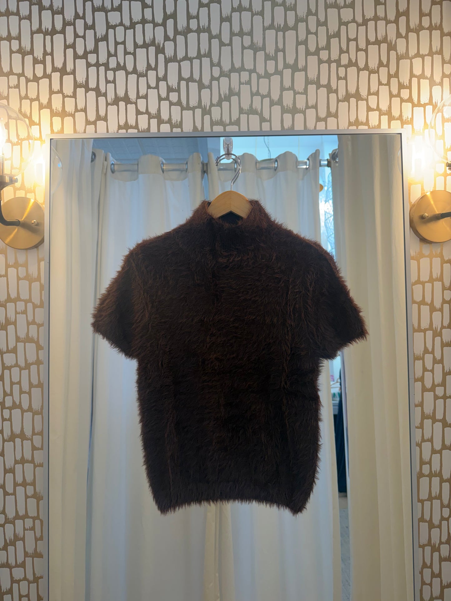 Elan dark brown fuzzy short-sleeve mock neck sweater on wooden hanger