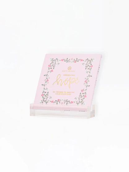 Mary Square pink Verses for Hope 52-card block in clear acrylic display stand, angled view
